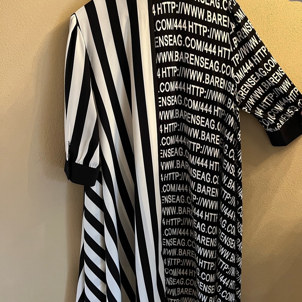New, tunic , black/white size medium, front 30”L, back 40”L, sides 43”L